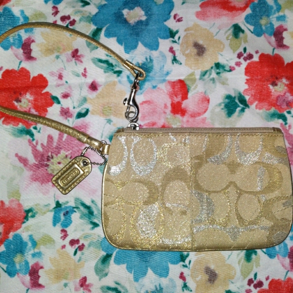 COACH Gold & Silver shimmering sparkles wristlet.